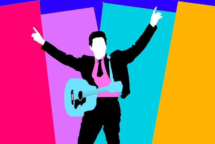 Brightly-coloured, stylised cartoon depiction of a man in a 50s suit, guitar slung around his chest, his arms raised in the air