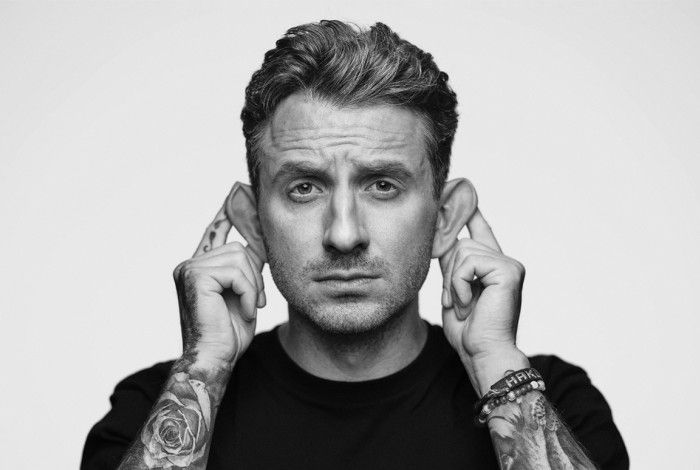 Tommy Little - Man holding his ears