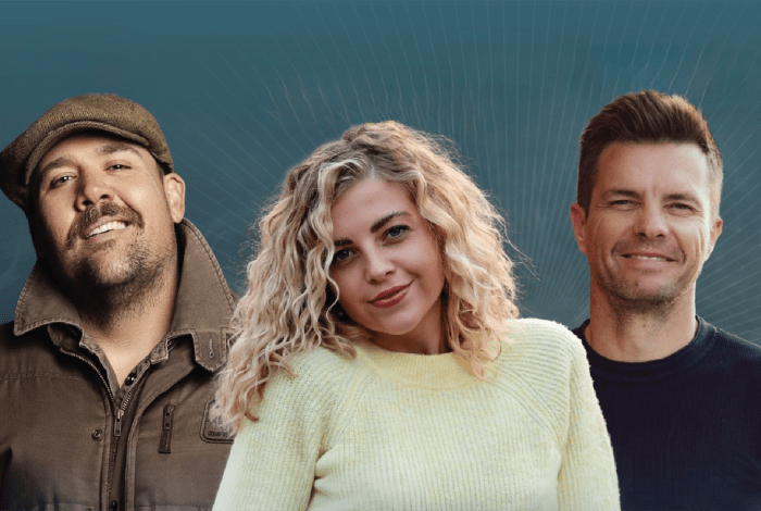 Three people looking at the camera smiling.