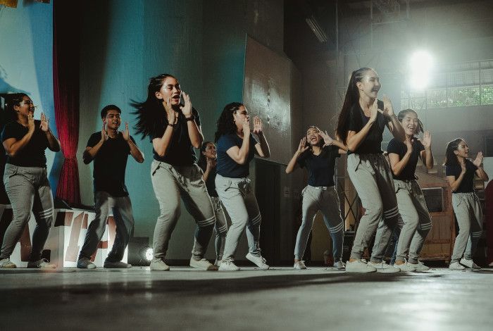 group of young people dancing