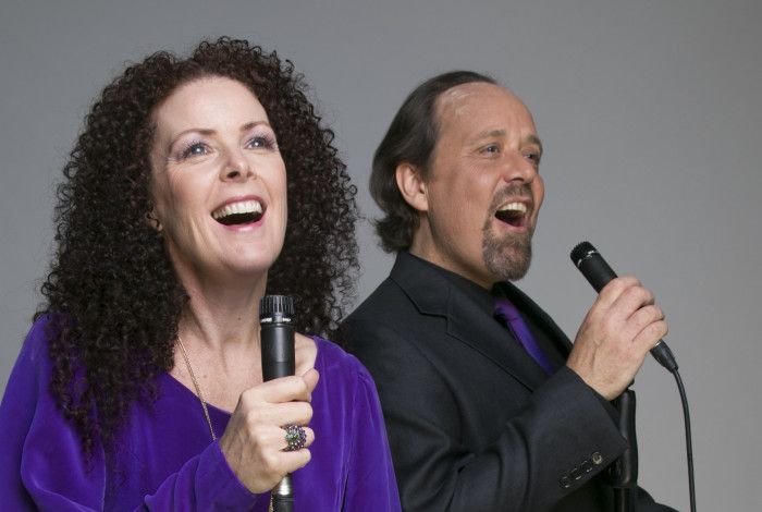 A lady and a man singing