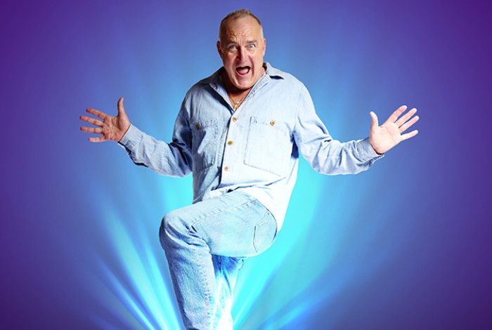 A man jumping with his hands out