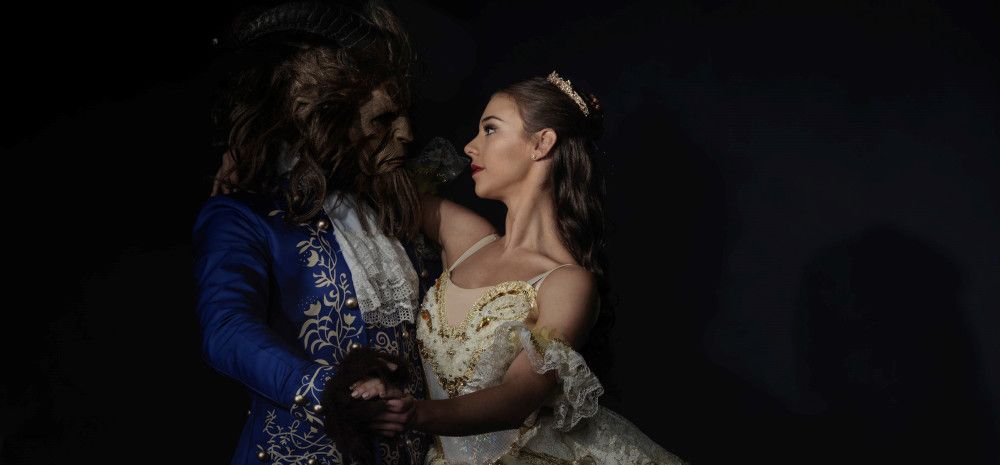 Beauty and the Beast ballet dancers, embracing in a dance pose