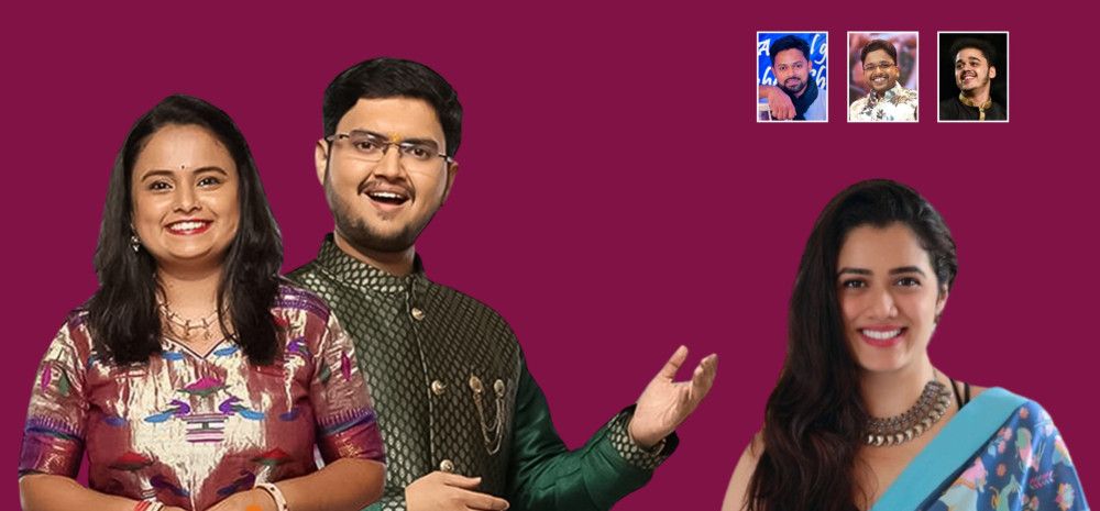 A man and a woman in traditional Indian attire, against a maroon background