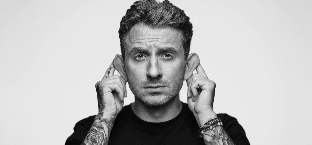 Tommy Little - Man holding his ears