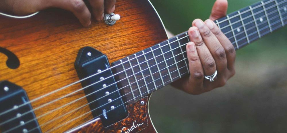 Someone playing a guitar