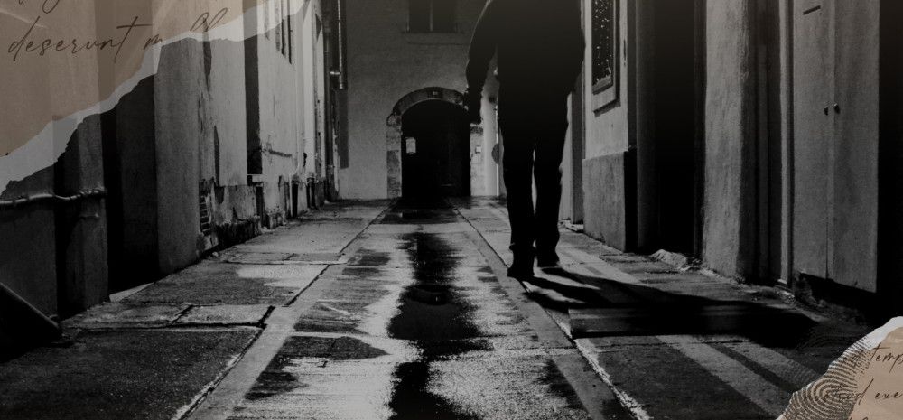 A person walking at night