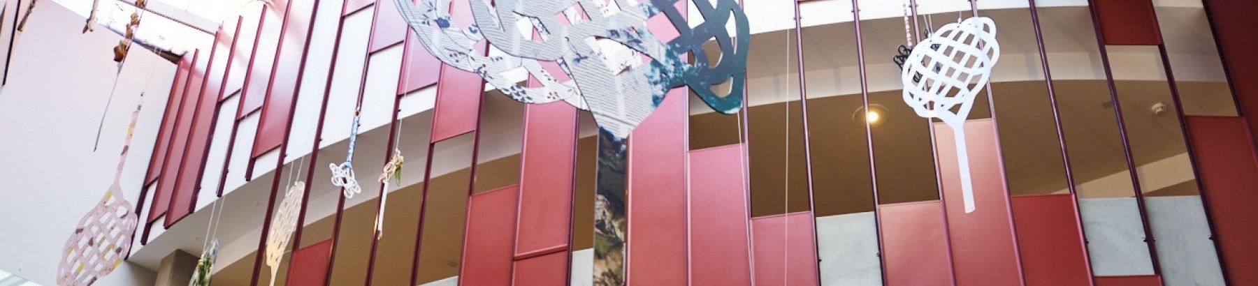 Artwork hanging from the celling at the Drum